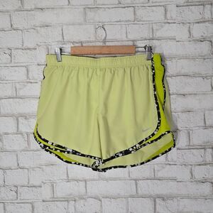 NIKE yellow athletic shorts